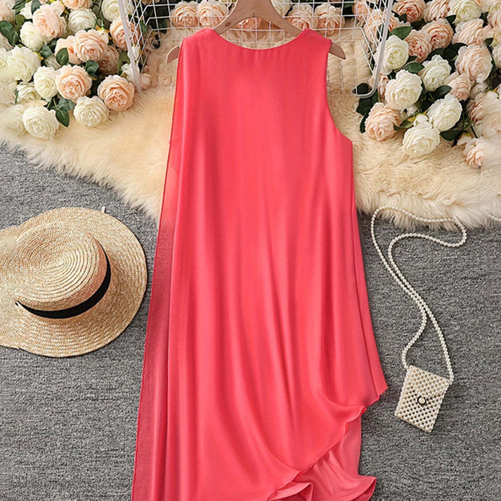 Manuela Albo™ Elegant sleeveless dress with round neckline and asymmetrical mesh