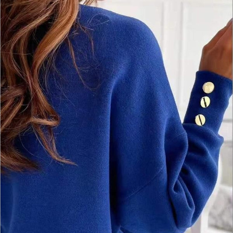 Chloé Rey™ V-neck sweater, fastened with gold buttons