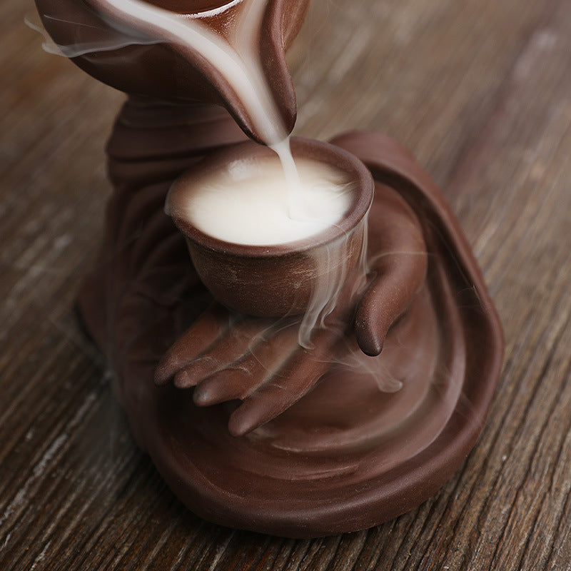 ZenFlow™ Hand-held Buddha teapot for aromatherapy