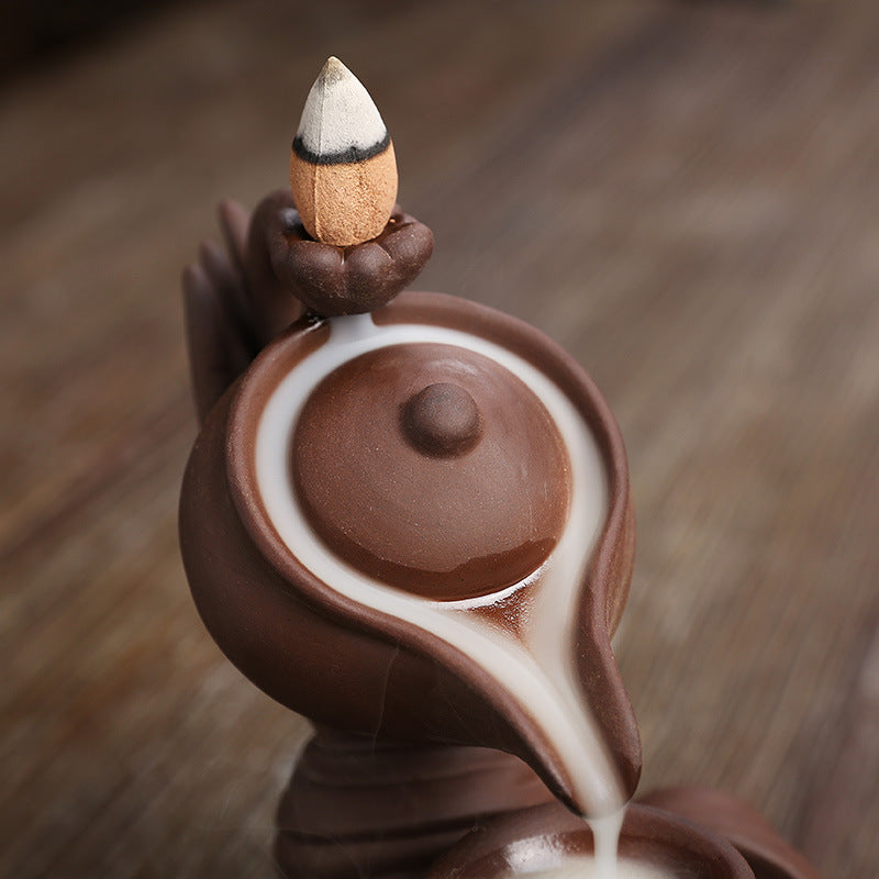 ZenFlow™ Hand-held Buddha teapot for aromatherapy
