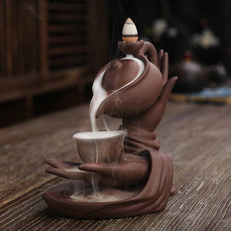 ZenFlow™ Hand-held Buddha teapot for aromatherapy