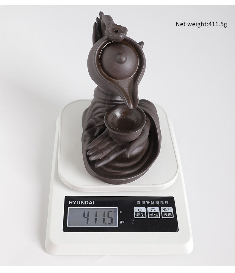 ZenFlow™ Hand-held Buddha teapot for aromatherapy