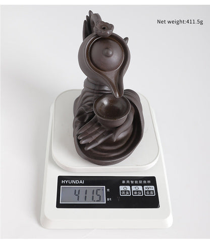 ZenFlow™ Hand-held Buddha teapot for aromatherapy
