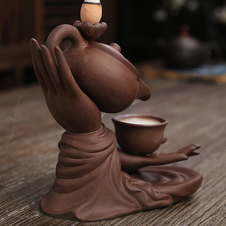 ZenFlow™ Hand-held Buddha teapot for aromatherapy