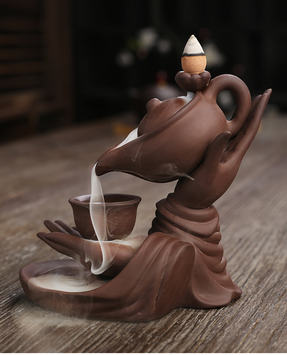 ZenFlow™ Hand-held Buddha teapot for aromatherapy