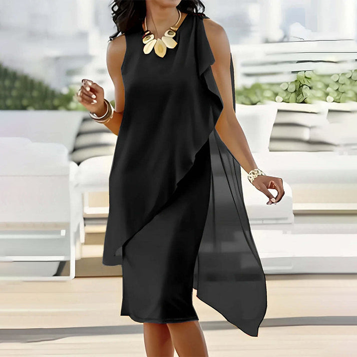 Manuela Albo™ Elegant sleeveless dress with round neckline and asymmetrical mesh