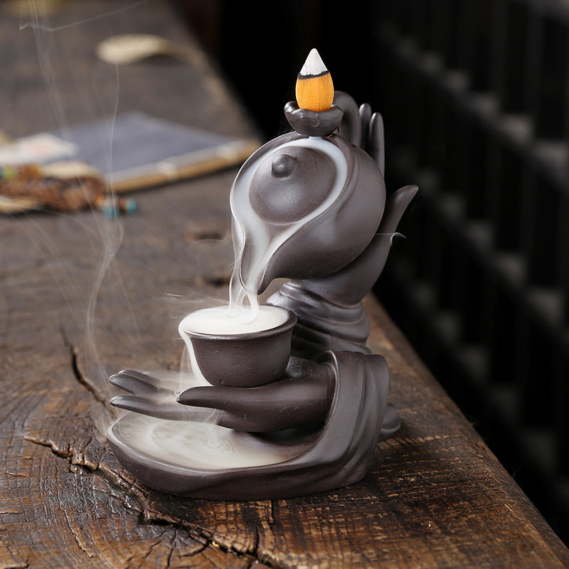ZenFlow™ Hand-held Buddha teapot for aromatherapy