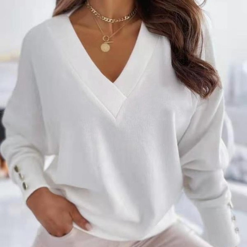 Chloé Rey™ V-neck sweater, fastened with gold buttons