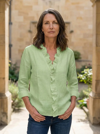 Caterina Ruffled V-Neck Casual Blouse - three-quarter angle view highlighting ruffle trim