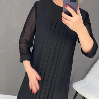 Norma New Straight Medium Sleeve Dress - side profile view of straight cut dress