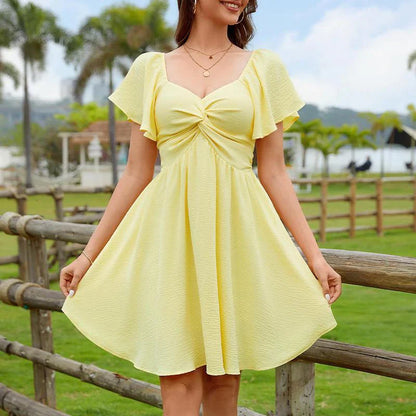 Paola Peretti™ Flattering Open Back Dress with Bow Detail