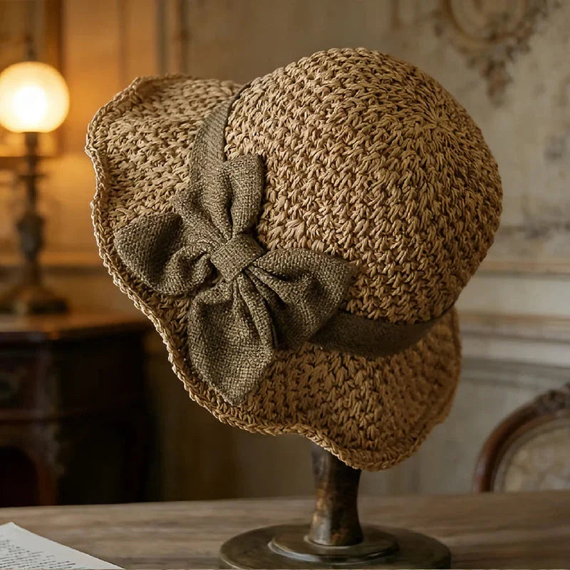 Seraphina Elegant Woven Straw Sun Hat with Bow - main product view of woven straw hat with decorative bow