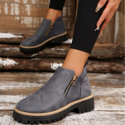 ZipStryde Sleek Zip Ankle Boots - close-up of heel construction and sole edge